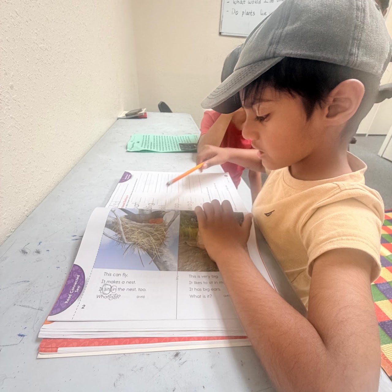 A young student taking time to practice at his desk